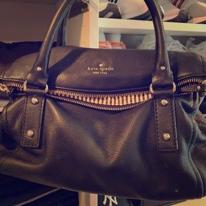Kate Spade black leather handbag striped interior